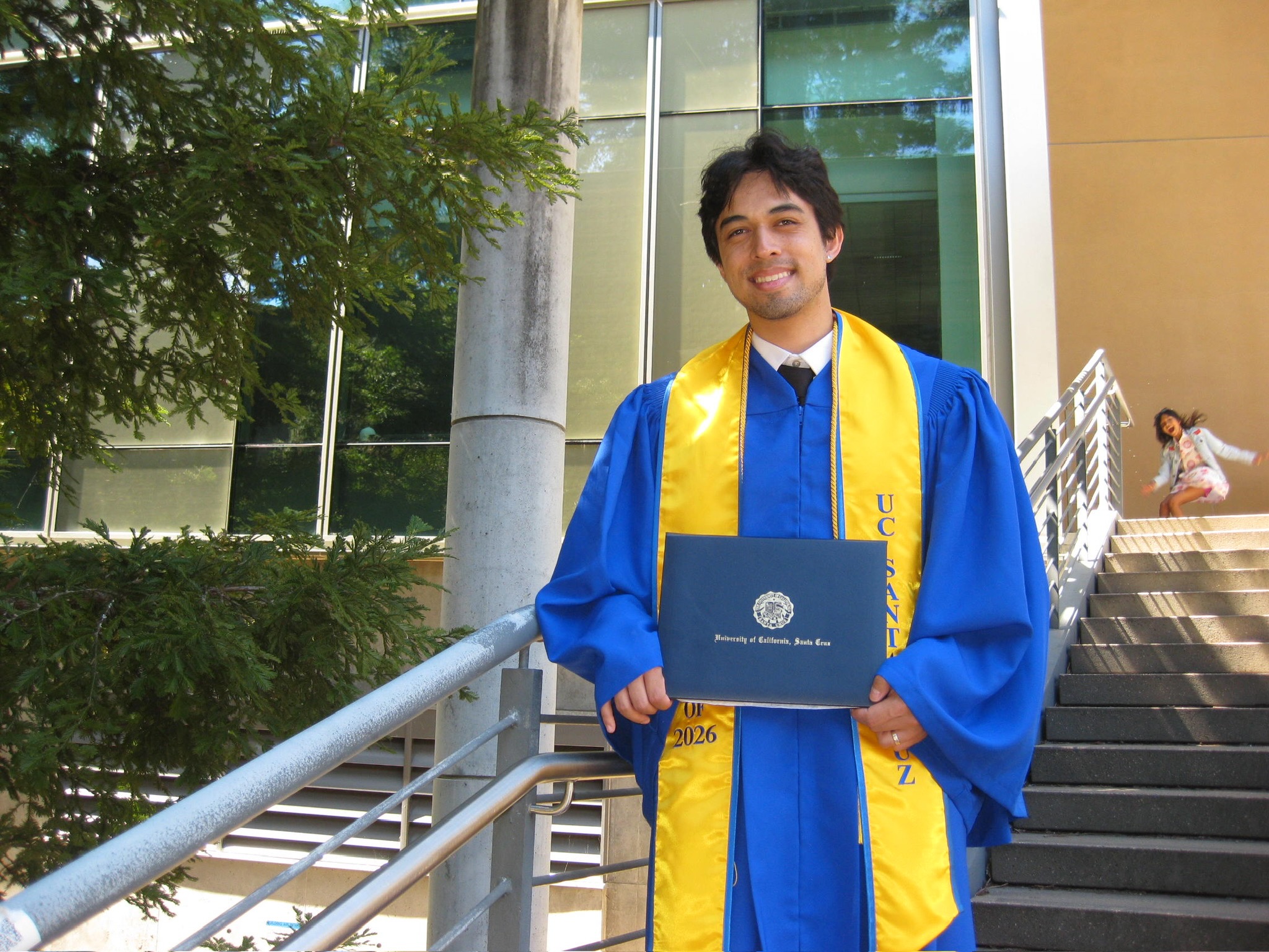 Jacob Poschl in graduation regalia